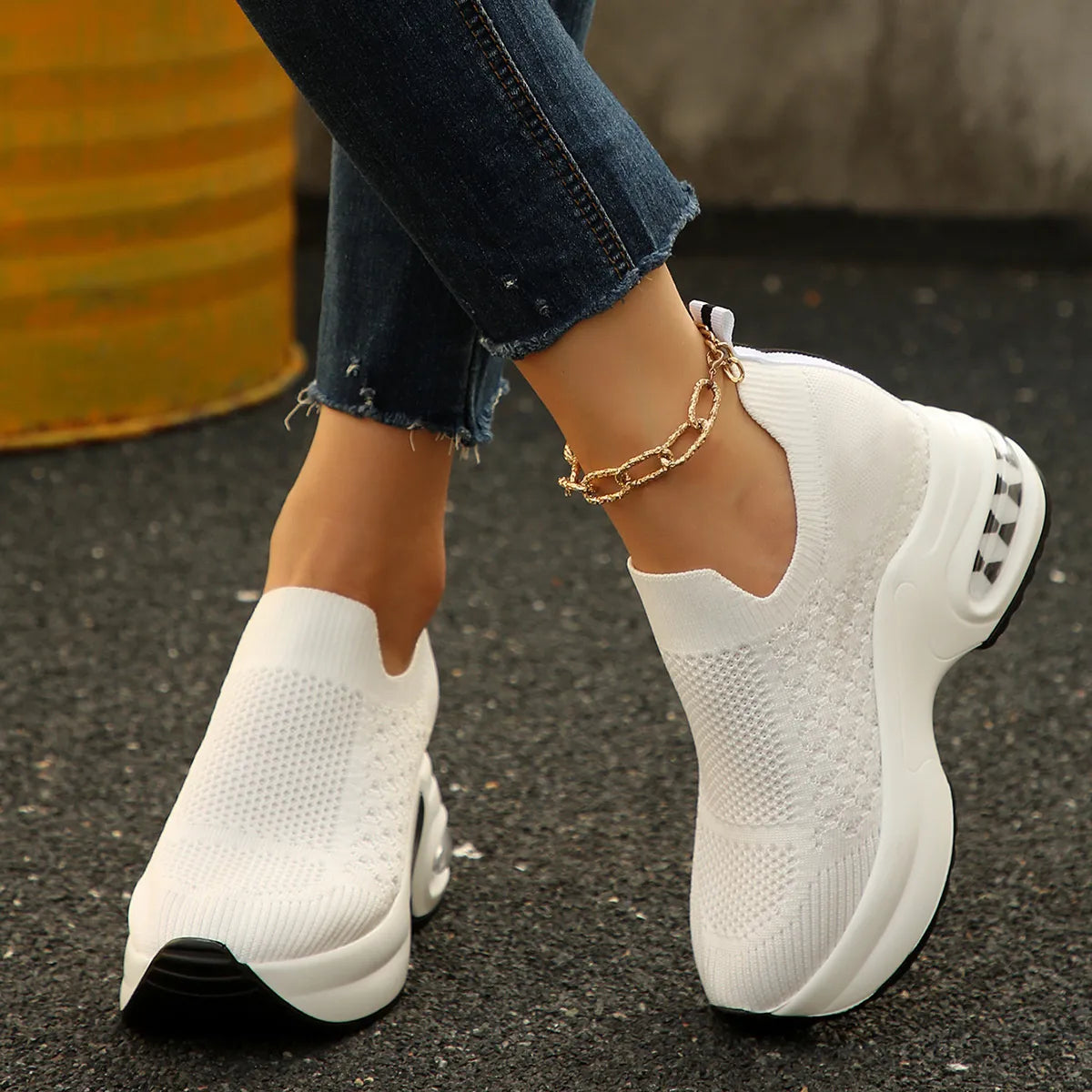 Model wearing Breathable Mesh Platform Sneakers outdoors