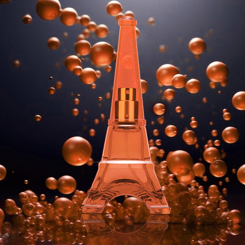 A Trip To Paris Women's Perfume displayed with travel-themed accessories