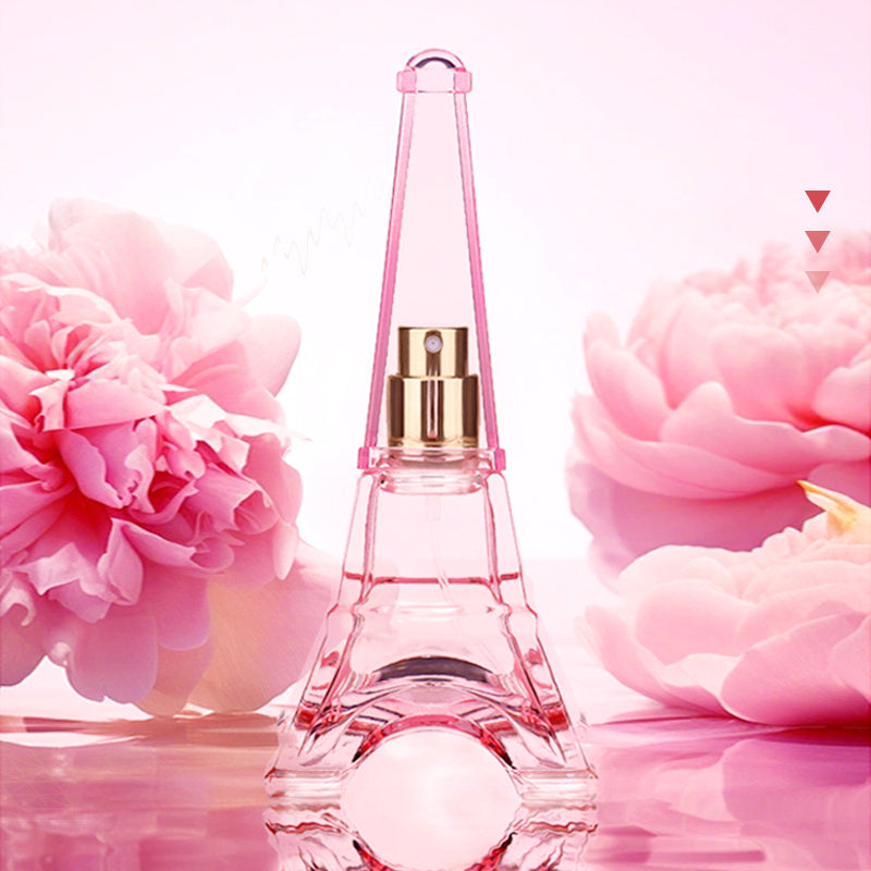Model applying A Trip To Paris Women's Perfume