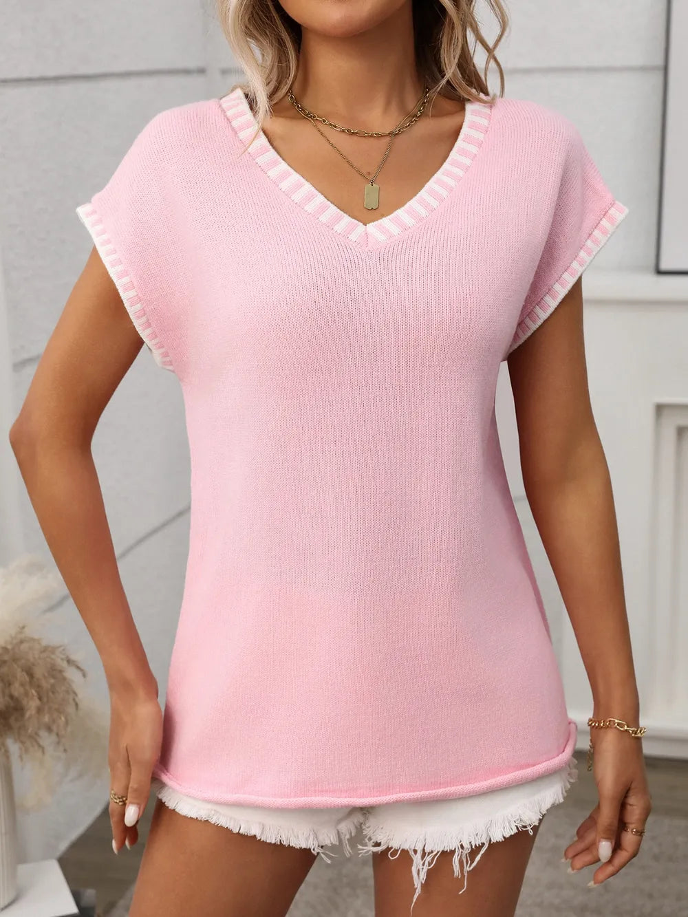 Model wearing Women's Contrast Trim V-Neck Short Sleeve Knit Top