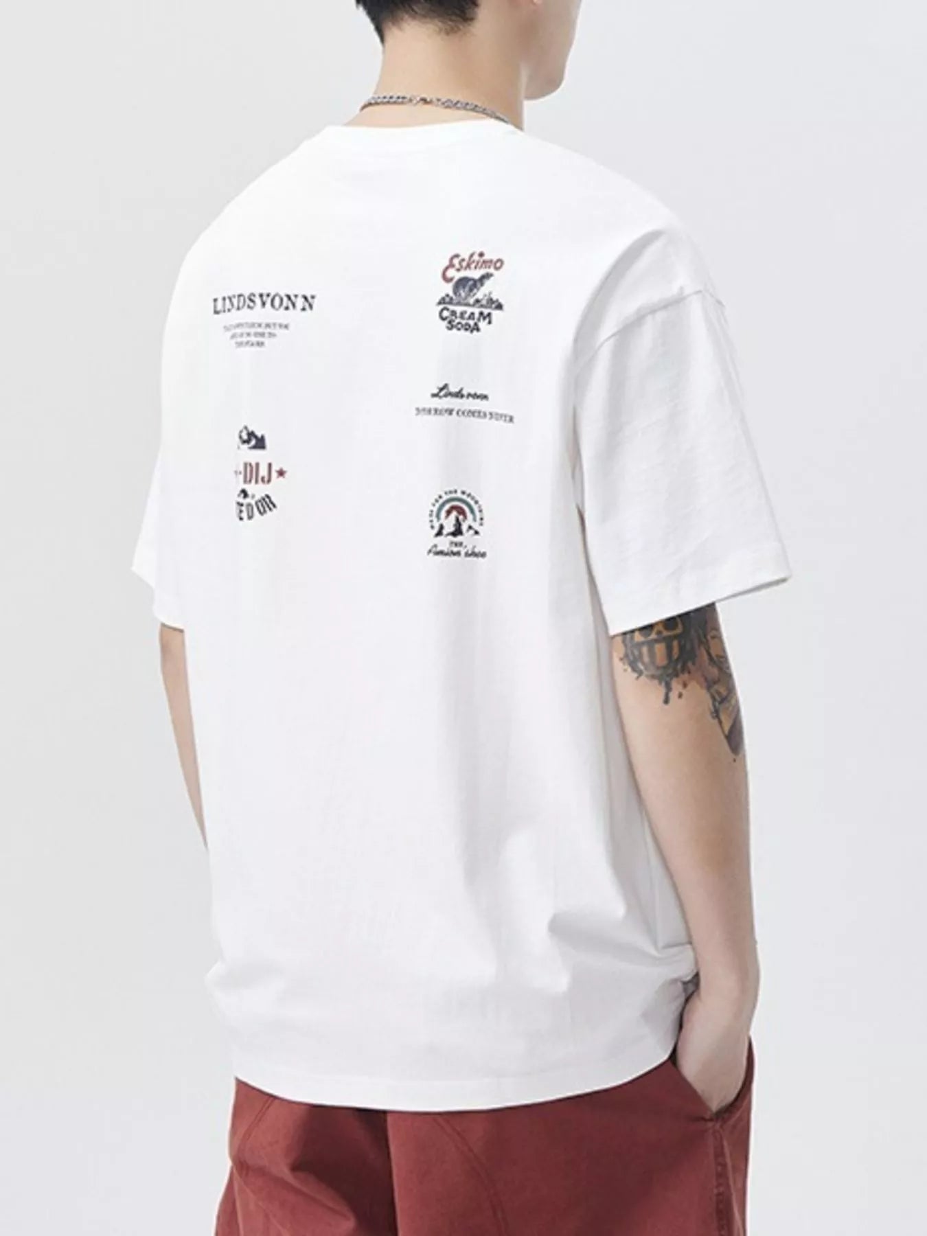 Folded Men's Plus Size Round Neck Short Sleeve T-Shirt on table