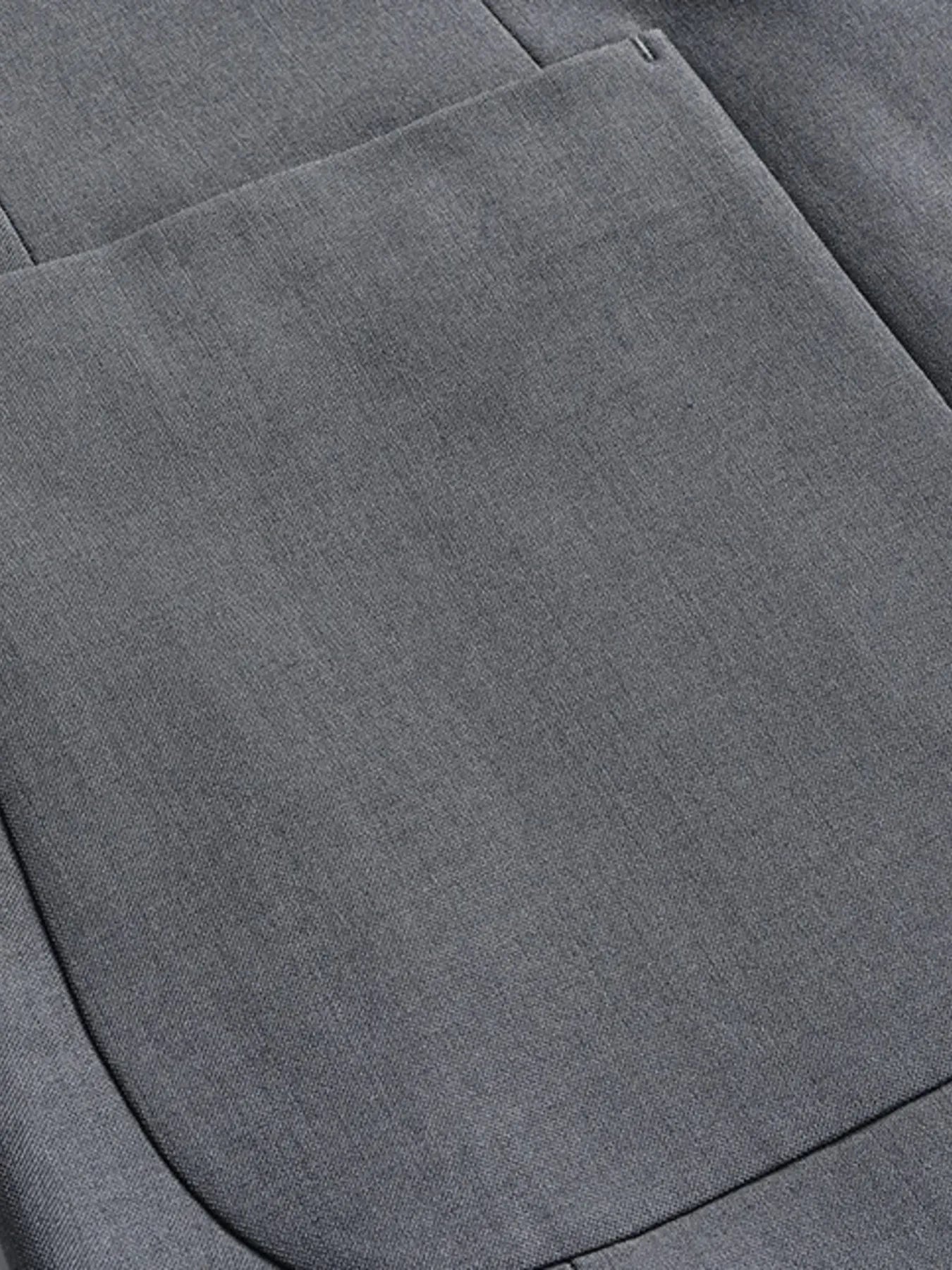 Men's lapel collar long sleeve blazer on model standingMen's lapel collar long sleeve blazer on model standing