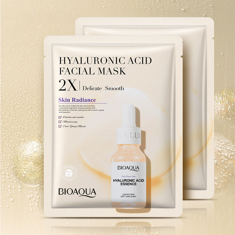 Flat lay of collagen face mask tube with fresh fruits and herbs