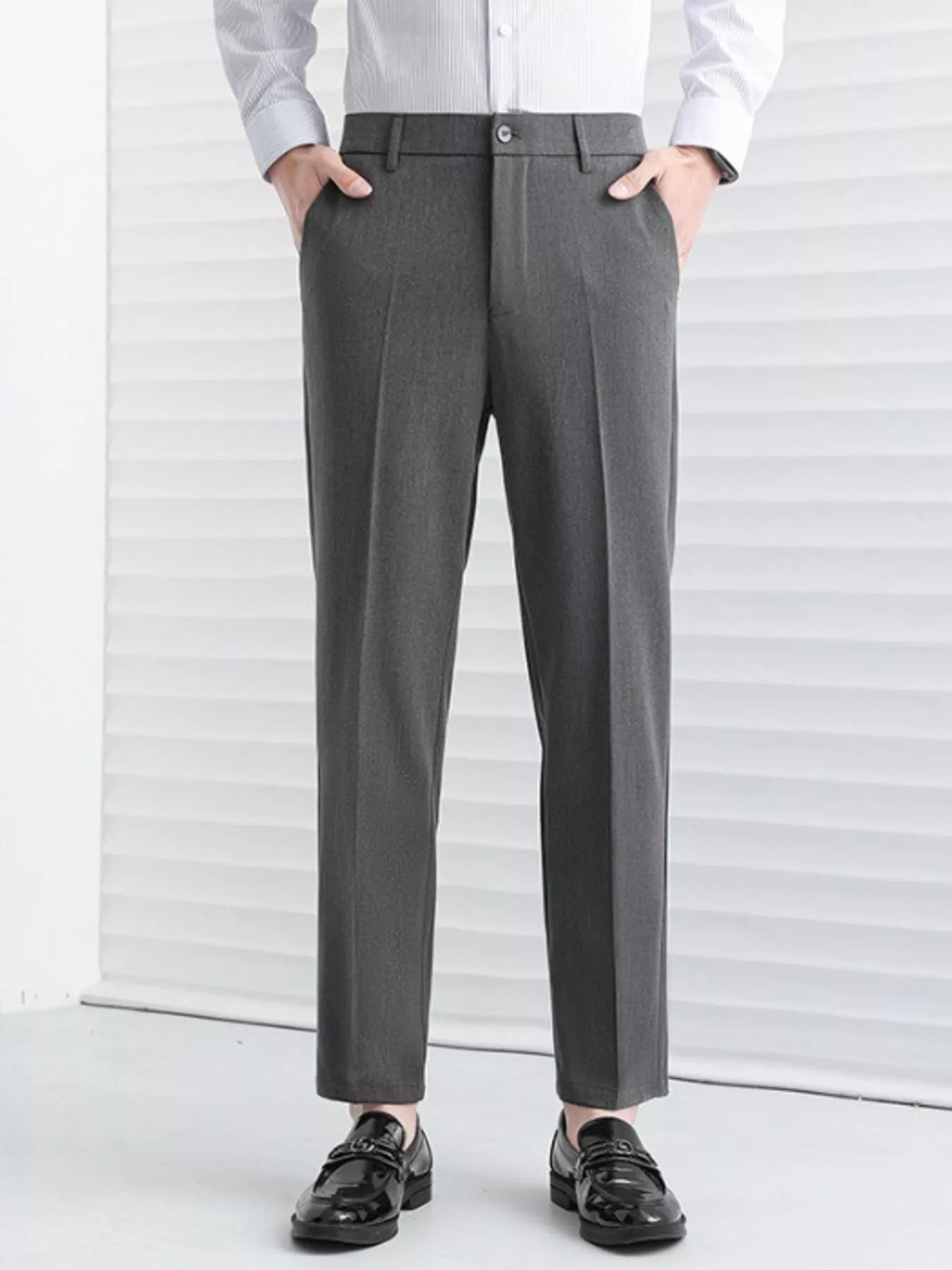 Men's straight leg pants on model standing