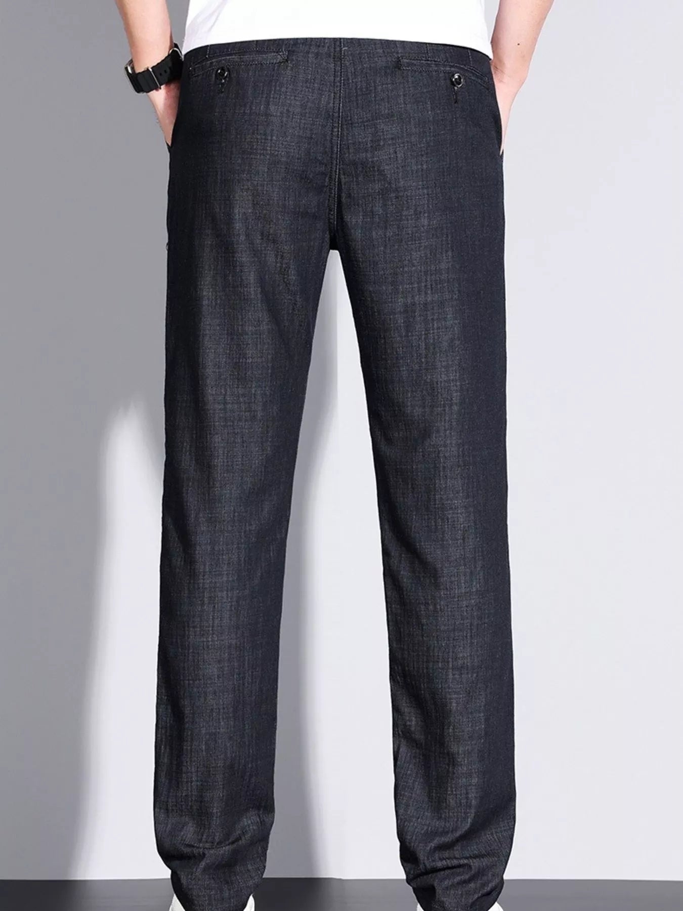 Men’s denim straight leg jeans back view