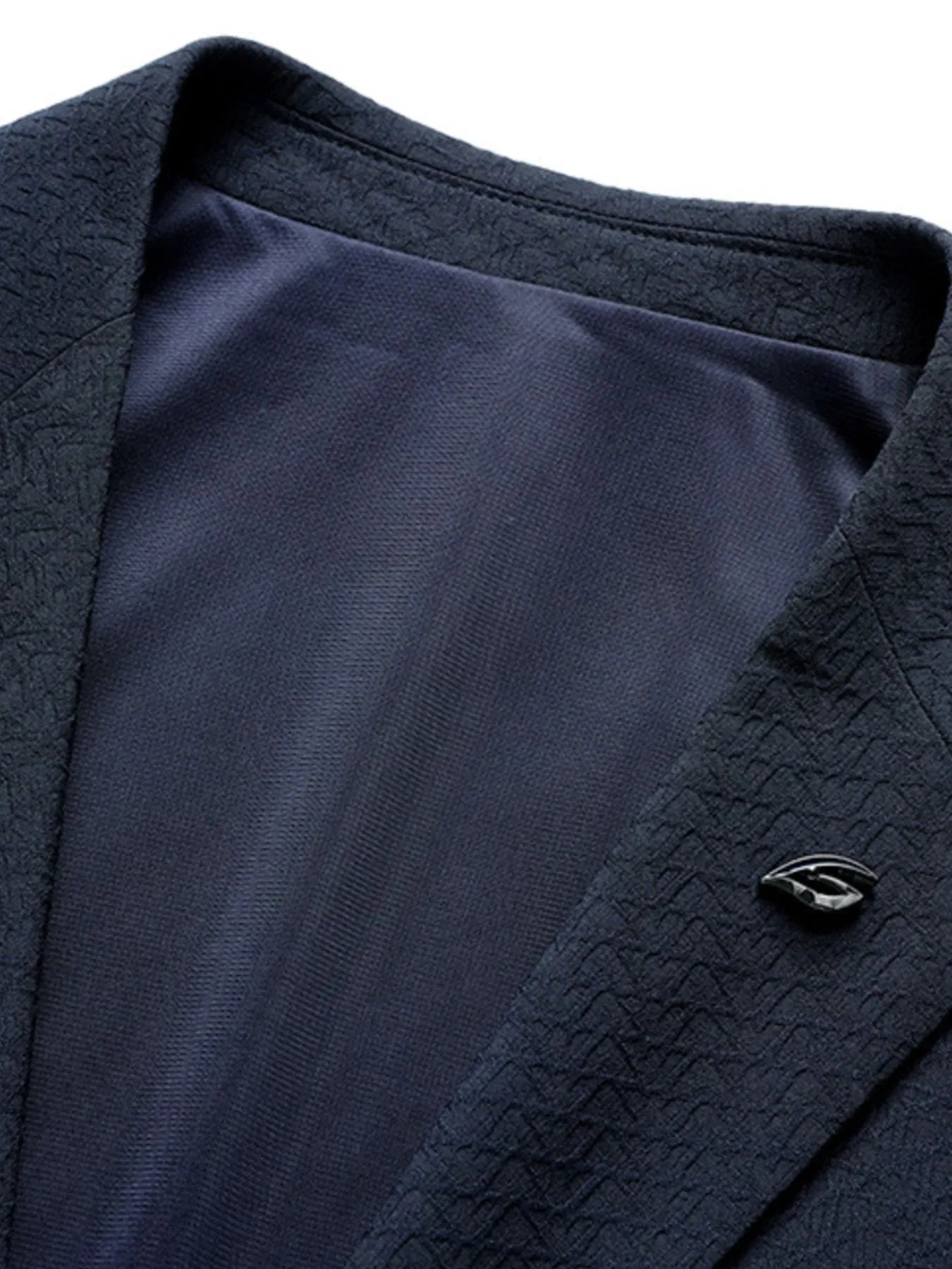 Men's button up long sleeve blazer on model standing