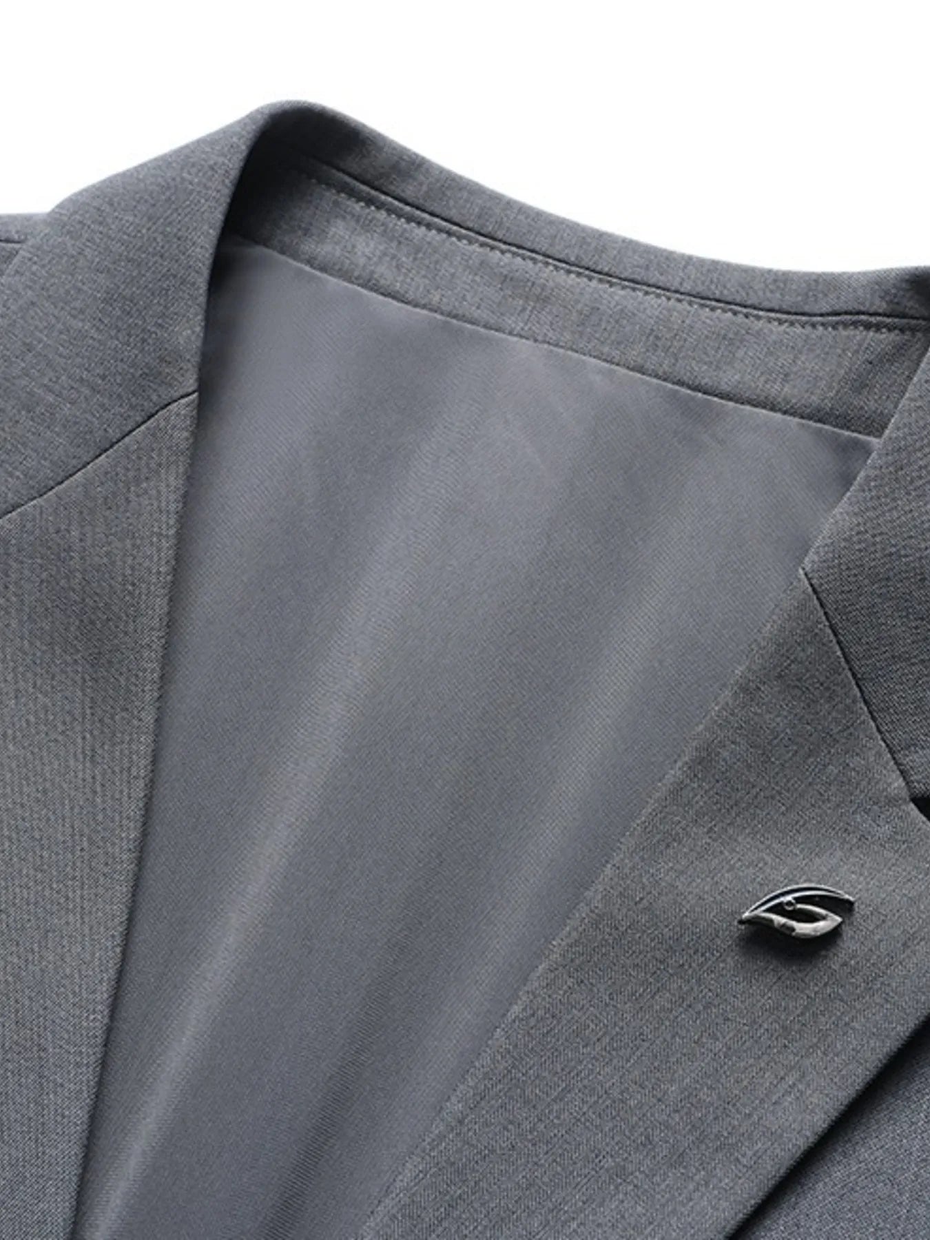 Men's lapel collar long sleeve blazer fabric detail