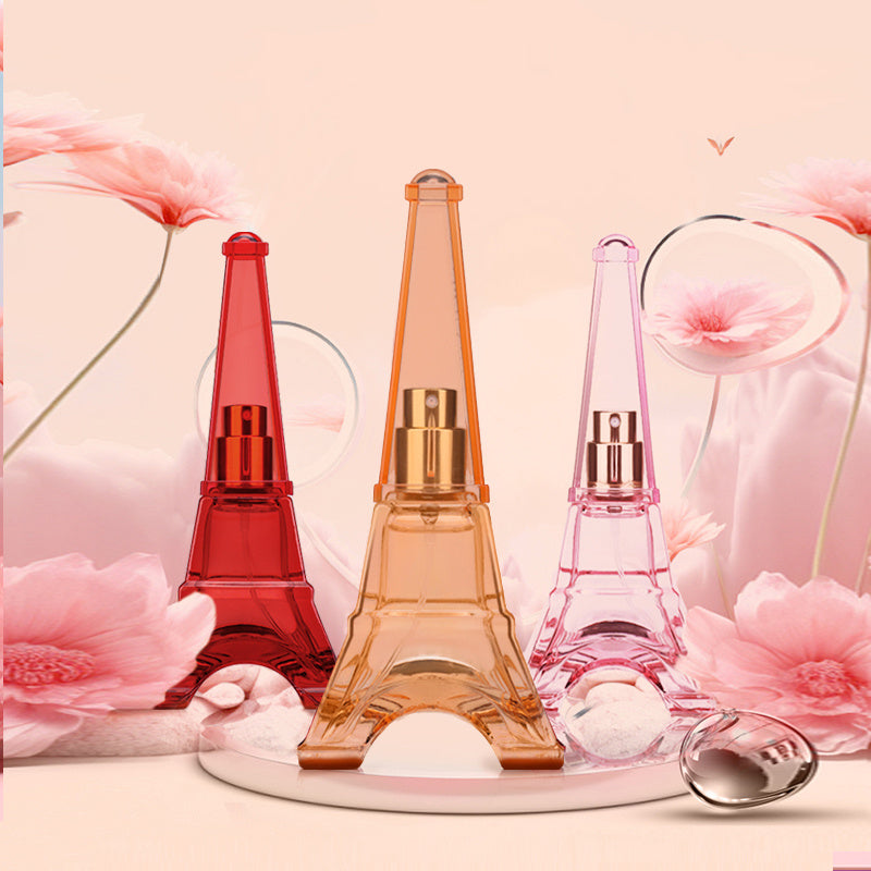 Bottle of A Trip To Paris Women's Perfume on a marble background