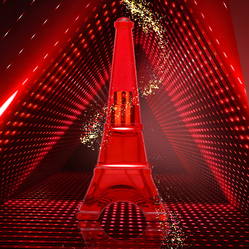 Close-up of A Trip To Paris Women's Perfume surrounded by fresh roses