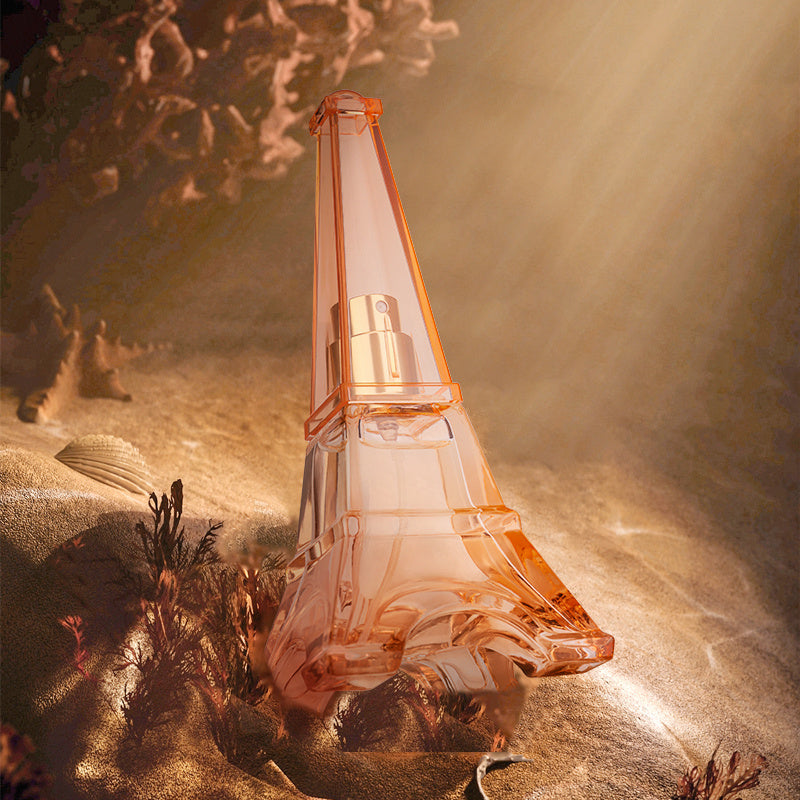Elegant packaging of A Trip To Paris Women's Perfume with Eiffel Tower background