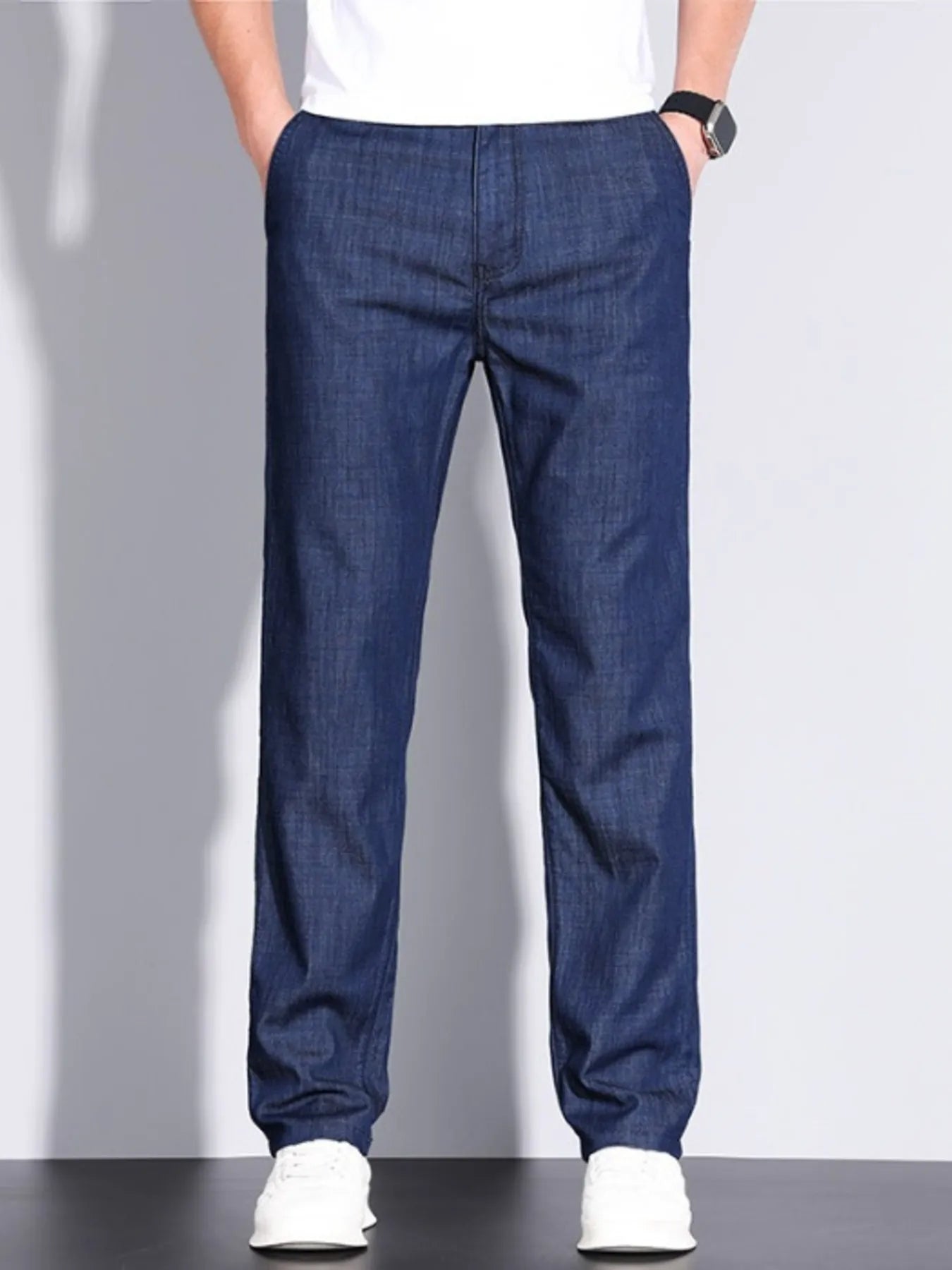 Front view of men’s denim straight leg jeans