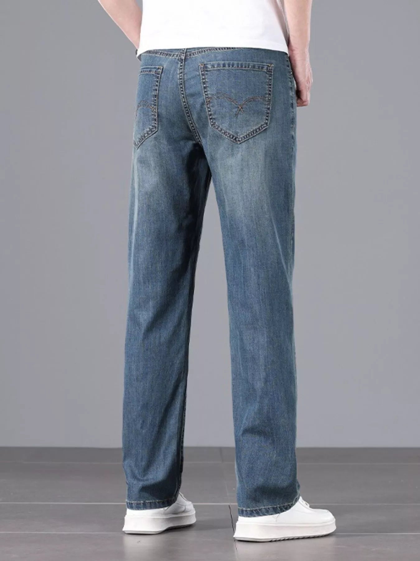 Men's straight fit wash jeans side view