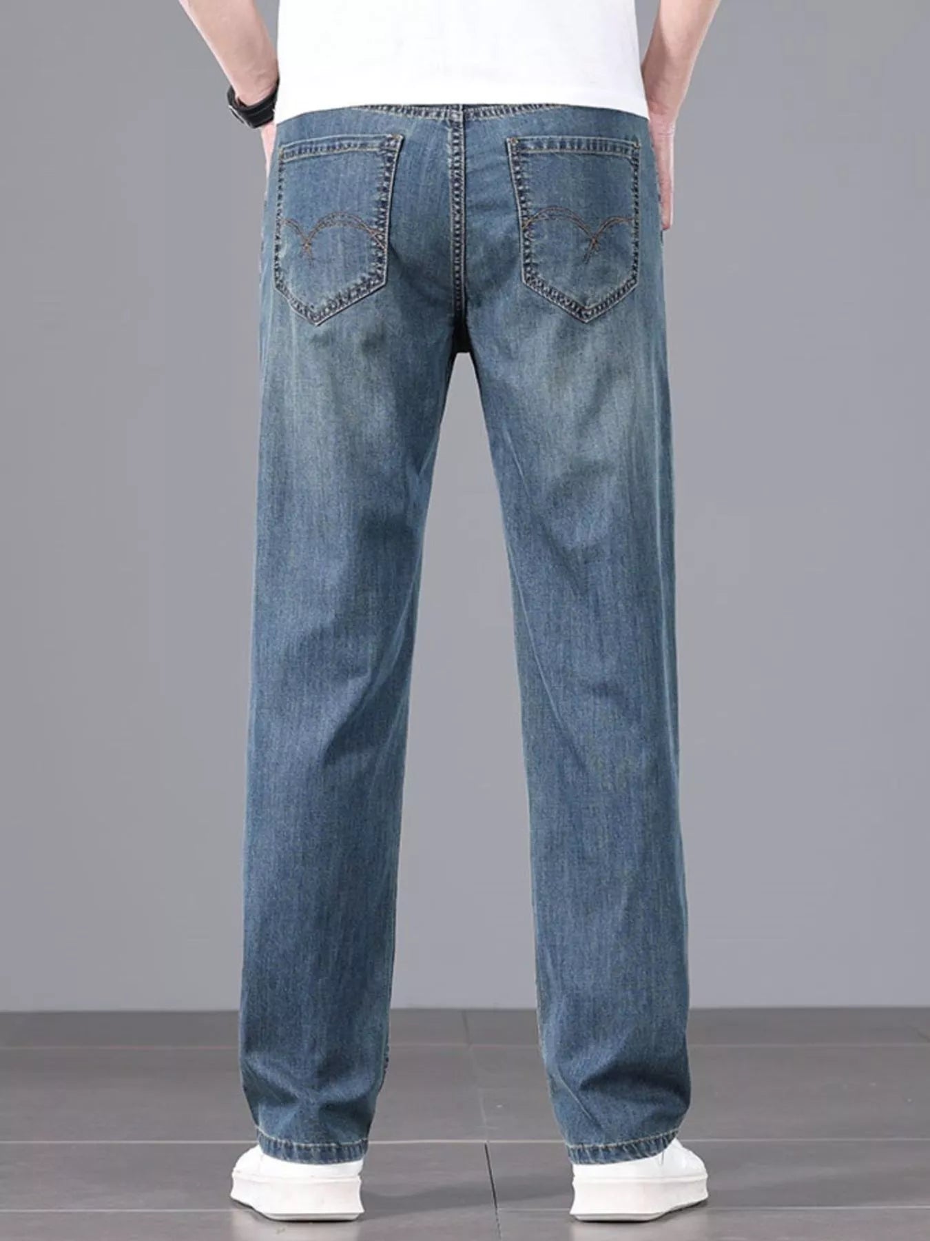 Men's straight fit wash jeans back view