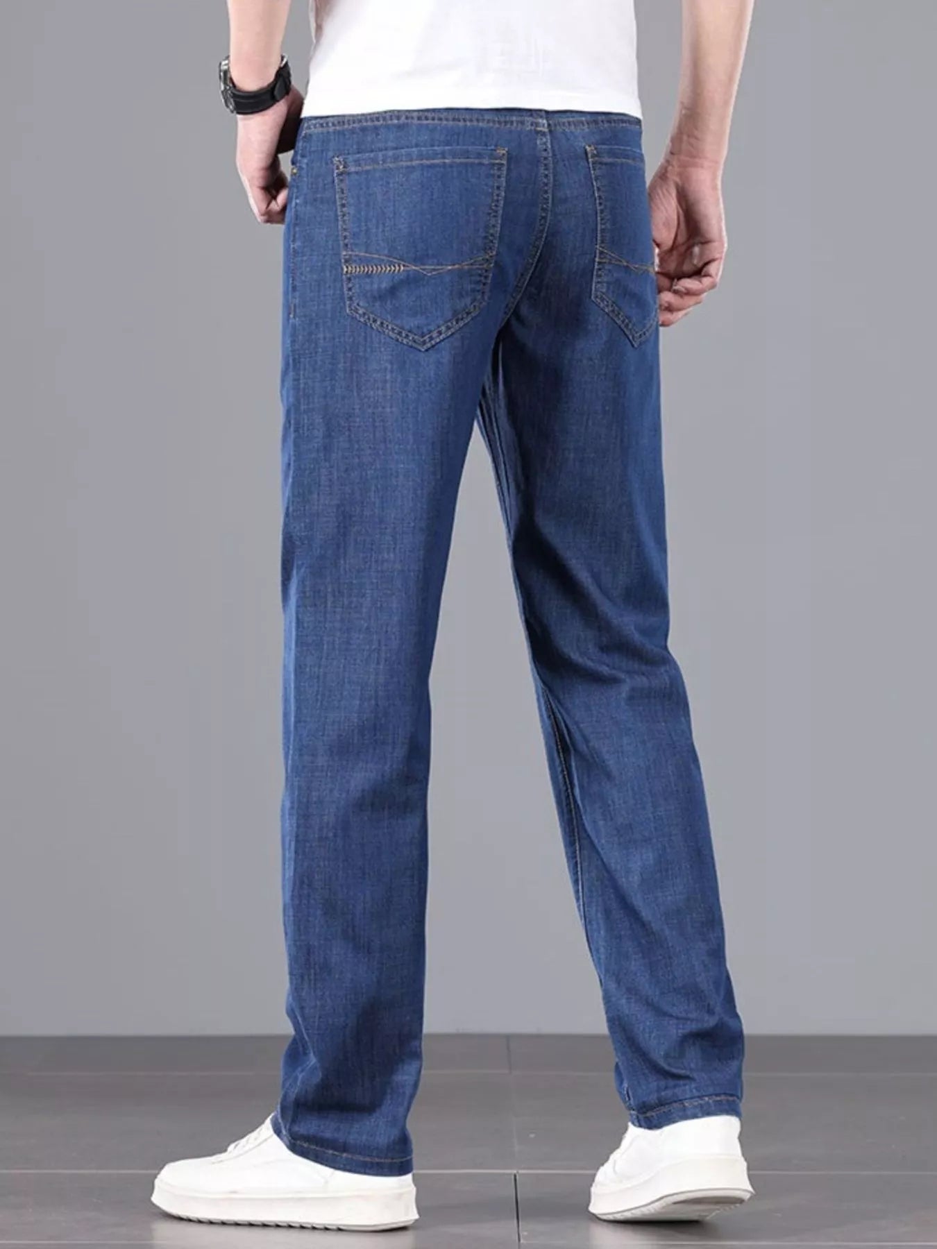 Comfortable men's straight leg jeans styled with shirt