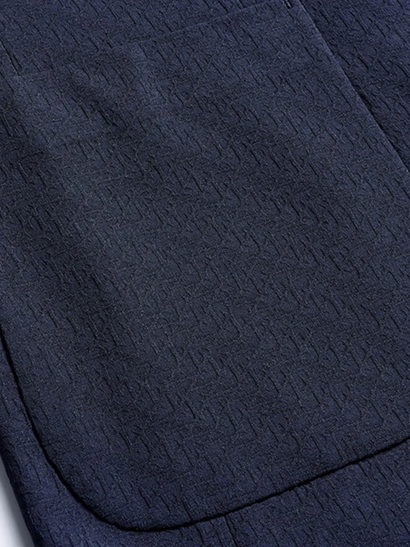 Men's button up long sleeve blazer folded flat lay